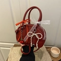 Deep red matte leather pillow bag with cherry charms and elegant lace bows - Red
