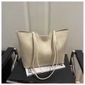 Minimalist cream beige tote bag with smooth faux leather texture and dual shoulder straps - Off White
