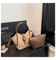 Detail view of stylish cream tote and brown pouch set with textured synthetic leather - Brown