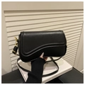 Minimalist black faux leather shoulder bag with wave cut flap and gold metal buckle - Black