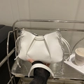 Chic white pleated crossbody bag with silver chain strap and matte synthetic leather finish - White