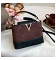 Brown and black quilted suede crossbody bag with V-shaped golden metal logo and top handle - Coffee