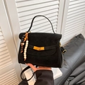 Chic black faux suede handbag with golden buckle and colorful wood bead charm accessory - Black (With Charm)