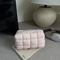 Minimalist light pink quilted makeup bag with puffy texture and grey zipper closure - Pink