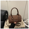 Brown suede Boston barrel bag with M'DoLnu logo and adjustable crossbody strap - Coffee