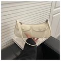 Chic beige faux leather underarm baguette bag with multi-pocket design and silver zippers - White