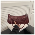 Deep burgundy glossy faux leather baguette bag with dual decorative front pockets - Red