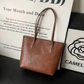 Retro deep brown woven tote bag with long handles for stylish commuting and shoulder wear - Brown