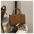 Minimalist brown tote bag with vertical striped embossing and adjustable shoulder strap - Brown