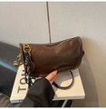 Dark brown barrel shoulder bag in lychee pattern faux leather with gold tennis racket charm - Coffee with Pendant