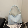 Borsa tote celeste in ecopelle con ricamo arcobaleno e manici annodati per uso quotidiano - Blu