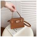 Brown pebbled leather crossbody bag with vintage gold hardware and top handle - Brown