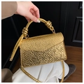 Golden lychee pattern small square bag with decorative knot handle and crossbody strap - Gold