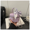 Lavender quilted crossbody bag with golden chain and decorative silk bow ribbon - Purple