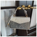 Silver snakeskin pattern crossbody bag with knotted handle and golden hardware - Silver