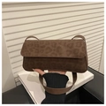 Close-up of leopard print shoulder bag with suede texture and rectangular flap design - Coffee