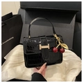 Black crocodile embossed patent leather crossbody bag with cherry charm and gold buckle - Black