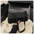 Elegant black leopard embossed rectangle shoulder bag with flap cover on white satin - Black