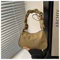 Detail of khaki shoulder bag with silver butterfly buckle and ruched handle - Green