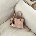 Pink checkered crossbody handbag with beaded charm and golden metal parts - Pink With Pendant