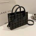 Sac fourre-tout élégant en tweed noir et doré avec anses en cuir et finitions dorées - Noir