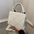 Elegant white quilted crossbody bag with top handles and adjustable shoulder strap - White