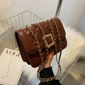 Deep brown quilted crossbody bag with gold chain strap and elegant metallic twist lock - Dark Brown