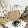 Schicke herzförmige Umhängetasche aus elegantem beigem PU-Leder im minimalistischen Design - Khaki