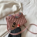 Pink quilted crossbody bag featuring gradient chain handle and golden metal clasp closure - Pink