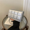 Chic silver quilted crossbody bag with a metallic finish and matching shoulder strap - Silver