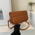 Caramel brown quilted square crossbody bag with padded grid pattern and silver hardware - Brown