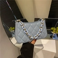 Quilted light blue underarm bag with chunky chain strap and faux leather texture - Blue