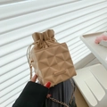 Elegant beige bucket bag with geometric quilted texture and gold chain strap - Khaki