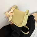 Light green faux leather saddle bag with decorative yellow plaid silk scarf on handle - Yellow