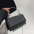 Chic black mini crossbody bag with silver rhinestones and a stylish round metal handle - Silver