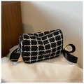 Chic black and white checkered tweed crossbody bag with adjustable wide strap and zip - Black