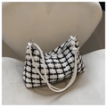Klassische schwarz-weiße Tweed-Tasche mit schlankem Lederriemen und Knotendetail - Weiß