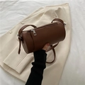 Dark brown faux leather barrel bag with silver zipper and adjustable shoulder strap - Dark Brown