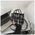 Chic black and white checkered tweed tote bag with leather handles and slim shoulder strap - Black