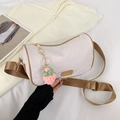 Pink quilted cylinder crossbody bag with fabric strap and strawberry charm - With Pendant / Khaki