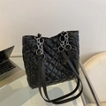 Large black quilted tote bag with silver chain straps for daily commuting - Black