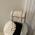 Chic beige quilted chain strap shoulder bag with gold hardware in a modern square shape - Off White