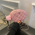 Pink quilted oval crossbody bag with chain strap and fuzzy ball charm pendant - Pink / Large