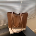 Minimalist caramel brown tote bag with contrast white stitching and double straps - Yellow Brown