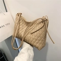 Chic beige quilted bucket bag with drawstring detail and minimalist diamond pattern - Khaki