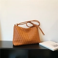 Brown quilted diamond tote bag with slim knotted shoulder straps and top zipper closure - Caramel color