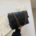 Classic black quilted chain shoulder bag in matte faux leather with elegant gold hardware - Black