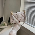 White quilted crossbody bag with brown pattern and woven handle for women - White