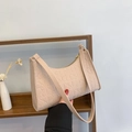 Minimalist beige felt underarm bag with embossed geometric patterns and sturdy strap - Khaki
