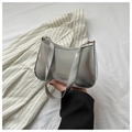Detail of silver metallic shoulder bag with double straps and fashion text print - Silver